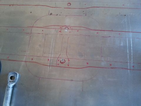 1984 Ford Bronco - Photo of a metal fabrication panel marked in red showing a planned access cutout.