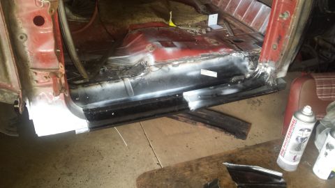 1984 Ford Bronco - Photo of a freshly fabricated rocker panel installed on a vehicle body during restoration, not a technical document.