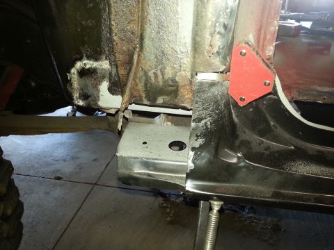 Welded cab mount and frame bracket repair with red welding magnet