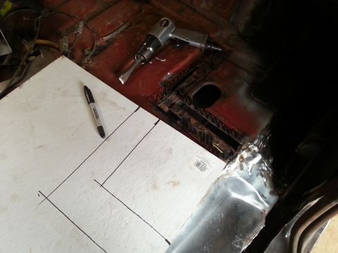 Floor pan opening with marker and template paper during sheet metal fabrication