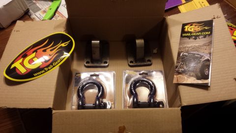 Trail-Gear D-ring shackles and mounts inside an open cardboard box
