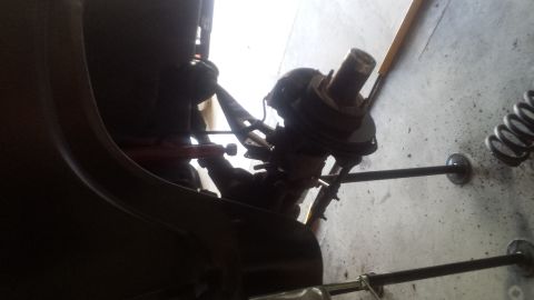 Truck front steering knuckle and suspension viewed from underneath