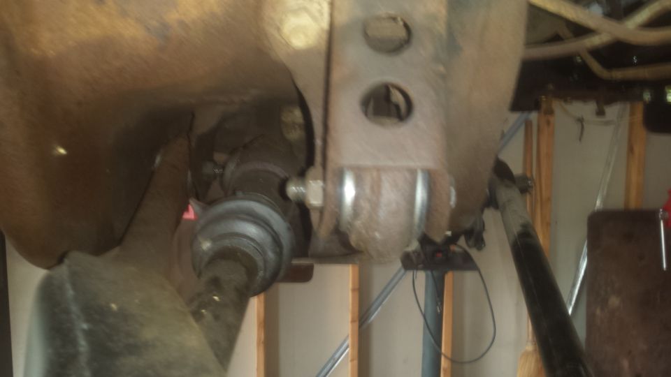 Front suspension, axle shaft, and frame of a truck from underneath