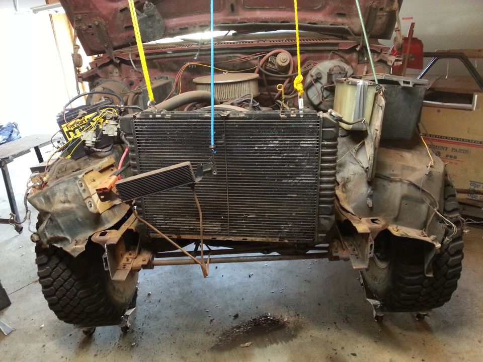 Photo of a truck front clip with exposed radiator and engine bay