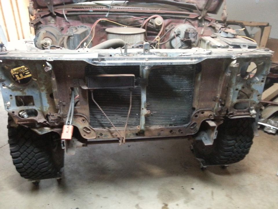Photo of a truck front core support and radiator with front clip removed