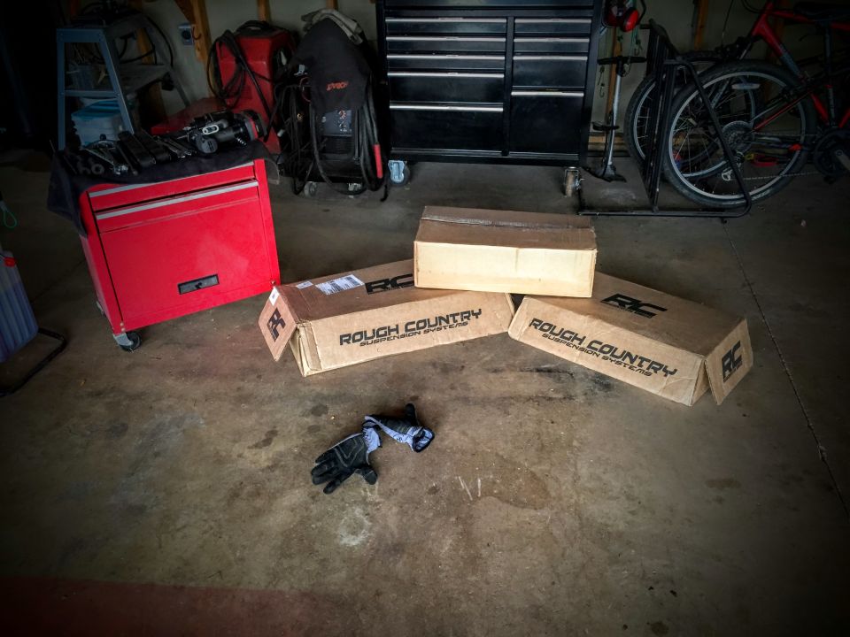 Model airplane kit on a table with some tools