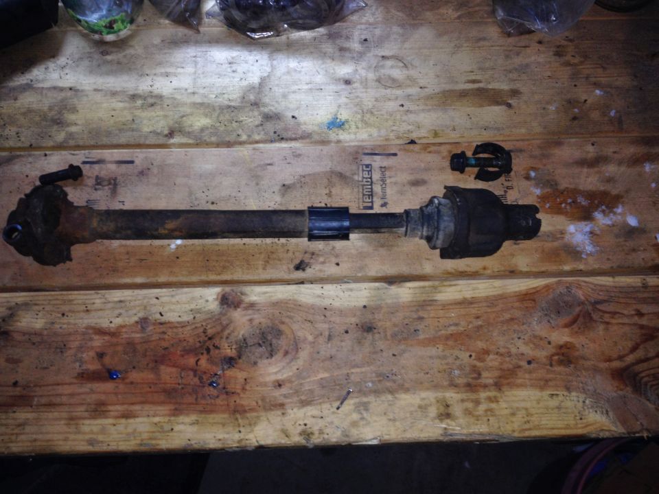 Steering linkage rod with ball joint and tie rod end, disassembled