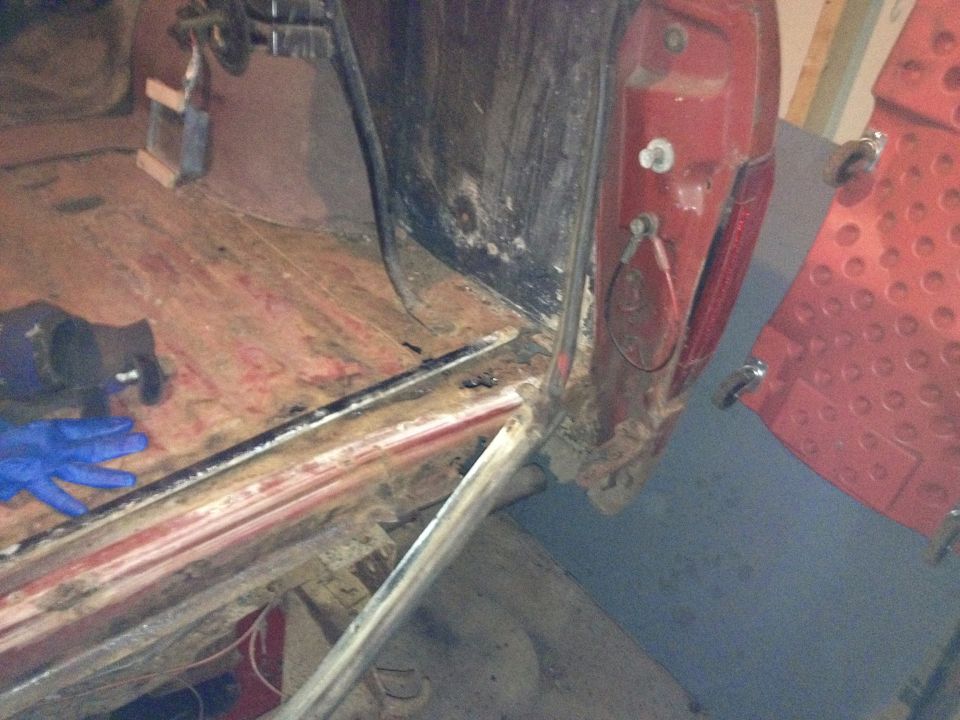Photo of a vehicle rocker and cab corner during rust repair
