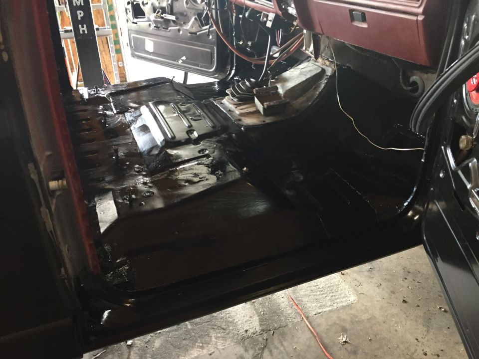 Photo of a freshly painted black vehicle cab floor