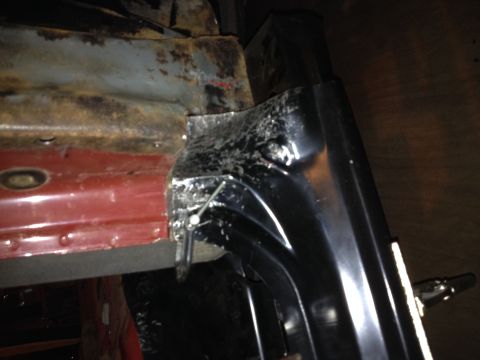 Close-up of weld and metal repair on a truck body panel