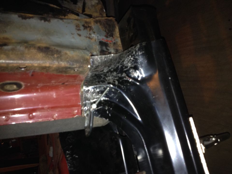 Close-up of weld and metal repair on a truck body panel