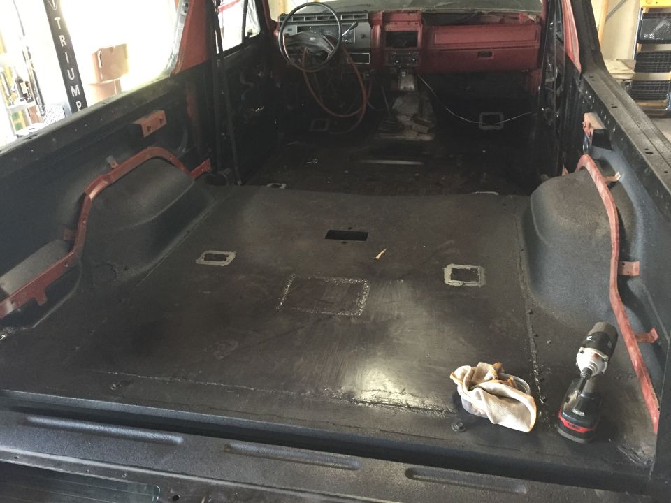 Stripped interior of a project truck cab and cargo area