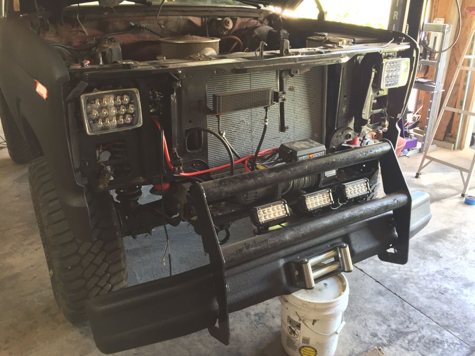 Truck front clip with LED lights and winch wiring exposed