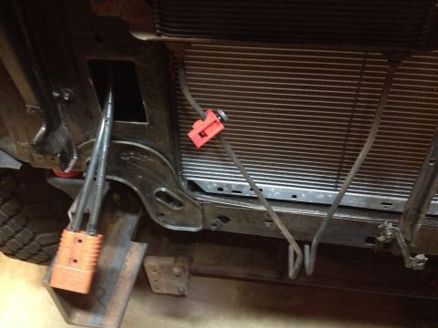 Vehicle radiator and wiring with orange connector