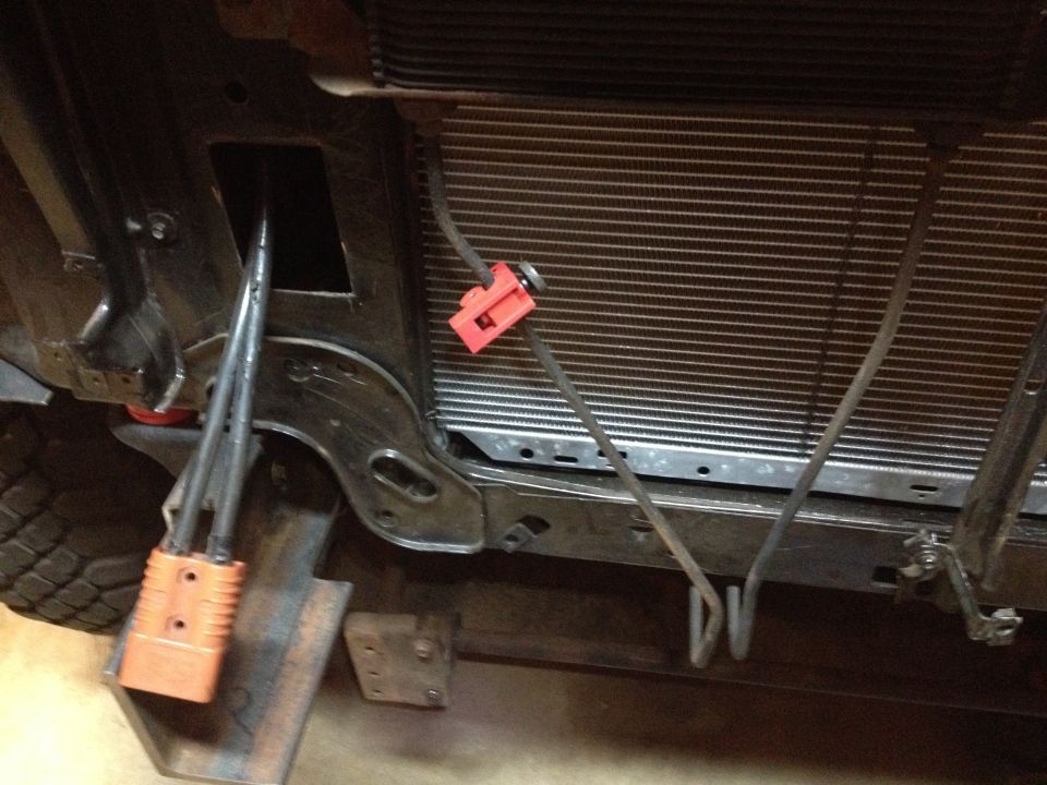 Vehicle radiator and wiring with orange connector