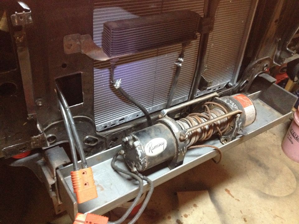 Ramsey electric winch mounted on a truck frame crossmember with wiring