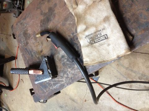Lincoln Electric welding ground clamp and electrode holder with leather gloves