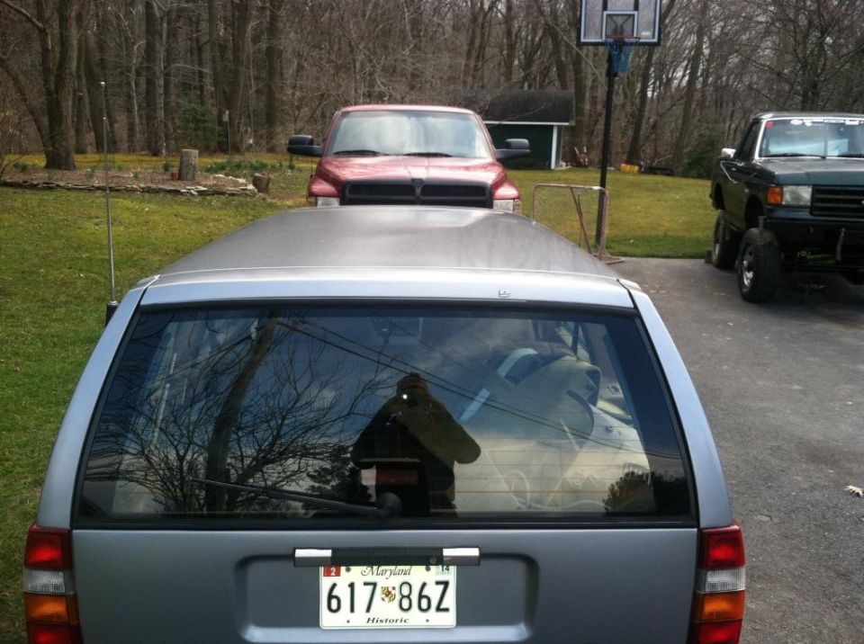 Silver 1991 Volvo 940 station wagon rear view with Maryland license plate 617-86Z
