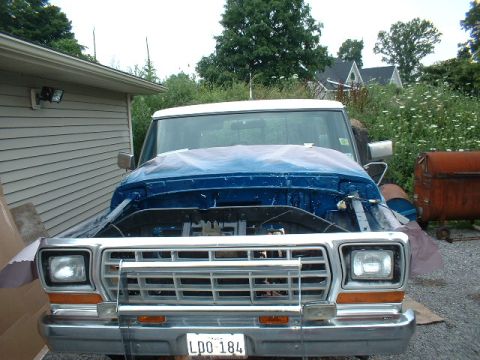 1978 Ford F-250 - Front view of a 1978 Ford F-250 pickup truck with its hood open, showing the engine bay.