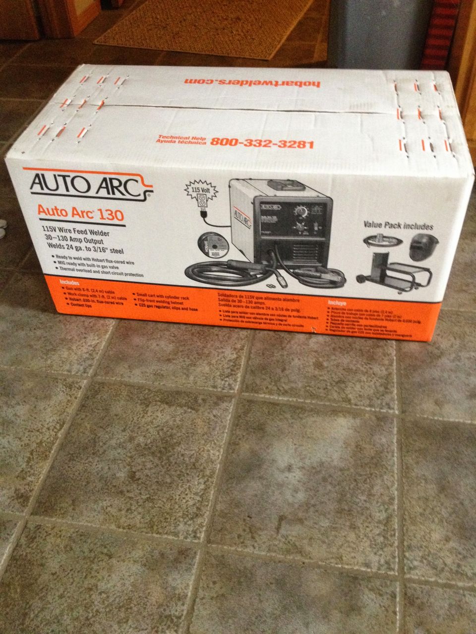Box for a Hobart Auto Arc 130 wire feed welder, shows a diagram of the welder and accessories