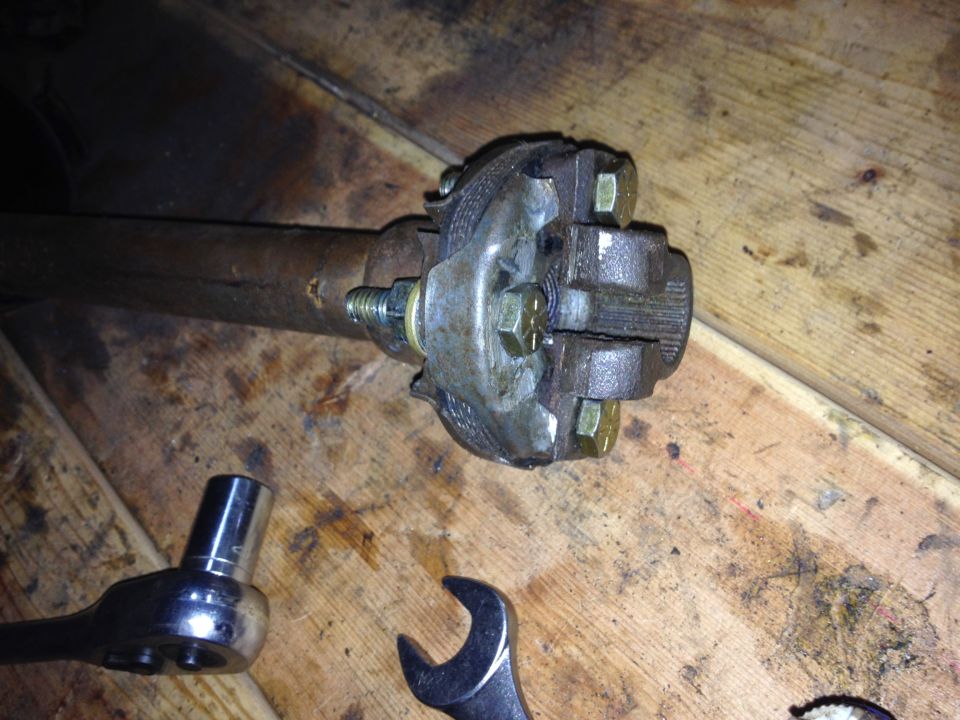 Driveshaft universal joint with socket wrench and open-end wrench