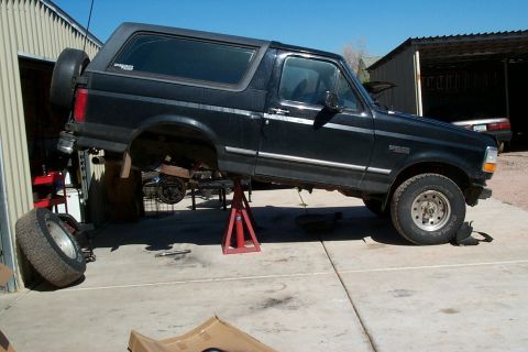 1996 Ford Bronco - Truck jacked up just a little.