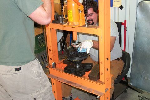 1996 Ford Bronco - Scott playing with the press. That is the third coolest tool he has. (It Follows by the plasma cutter and the welder of course)