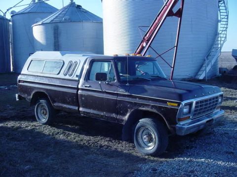 1992 Ford Bronco - This pickup truck appears to be from the 1970s, not a 1992 model as claimed.