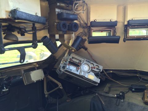 1993 Ford Bronco - Interior view of a vehicle, focusing on the dashboard and radio equipment.
