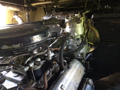 1993 Ford Bronco - Close-up view of an engine bay, the Supermotors.net logo in the lower right corner.