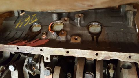1973 Ford F-100 - Close-up view of an engine block and crankshaft assembly.