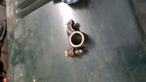 1973 Ford F-100 - A close-up view of a single engine valve rocker arm assembly.