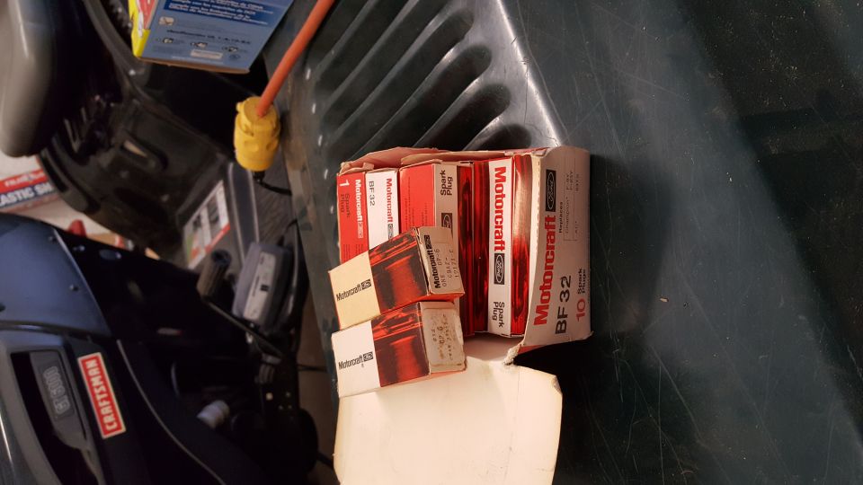 Boxes of Motorcraft BF32 spark plugs stacked up