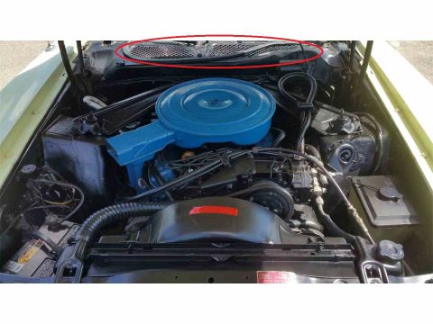 1971 Ford Mustang - Engine bay view of a 1971 Ford Mustang, a blue air cleaner and visible engine components.