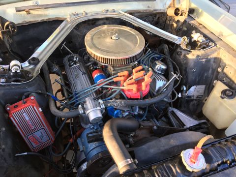 1968 Mercury Cougar - Engine bay of a 1968 Mercury Cougar, a V8 engine, chrome air cleaner, and an aftermarket MSD ignition system.