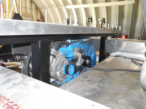1992 Ford Bronco - Engine components including alternator and belts are visible in this close-up view.
