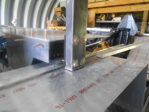 1992 Ford Bronco - Metal sheets are marked with red text and numbers, suggesting a fabrication process in a workshop setting.