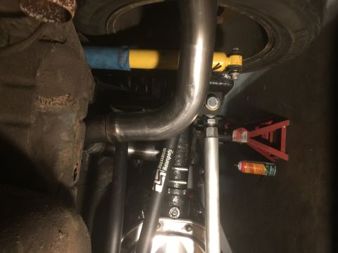 1983 Ford Mustang - Underside view of vehicle exhaust and suspension components, with visible 'Maximum Motorsports' branding.