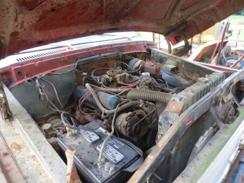 1967 Ford F-250 - Engine bay of a 1967 Ford F-250 showing the V8 engine and components.