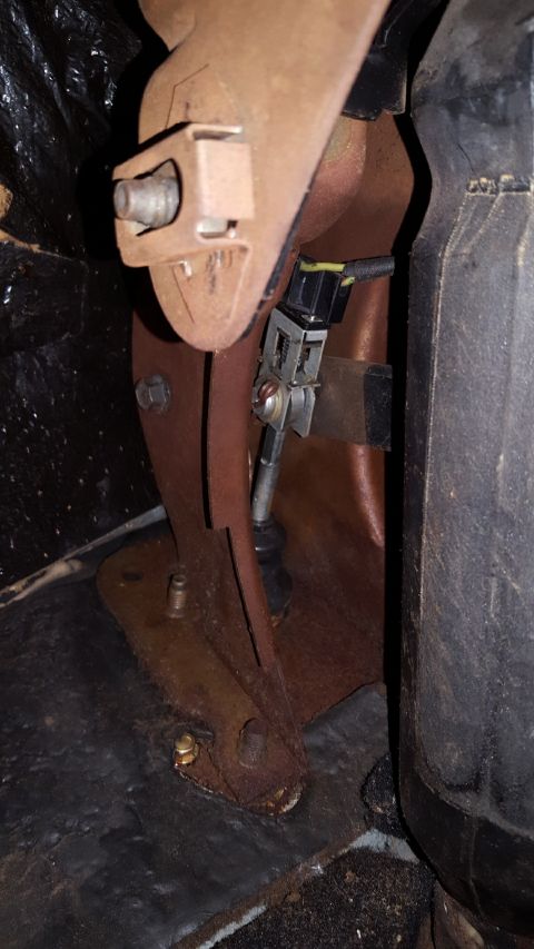 1971 Ford Mustang - Close-up of the interior pedal assembly, showing rust and wiring details.