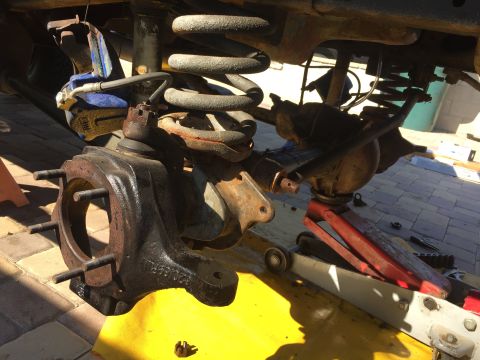 1978 Ford Bronco - Removing the bolt connecting the steering link with the knuckle can be a pain.