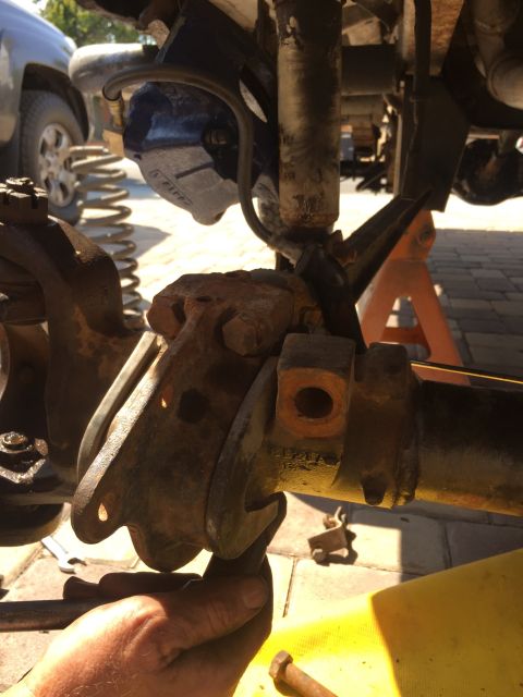 1978 Ford Bronco - Loosening some bolts.