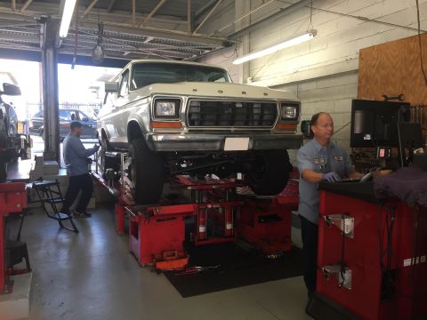 1978 Ford Bronco - A 1978 Ford Bronco is being serviced in a garage bay.