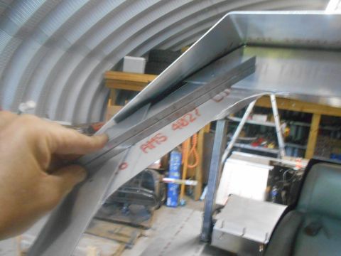 1992 Ford Bronco - Close-up of metal fabrication work in progress, showing a part with markings.