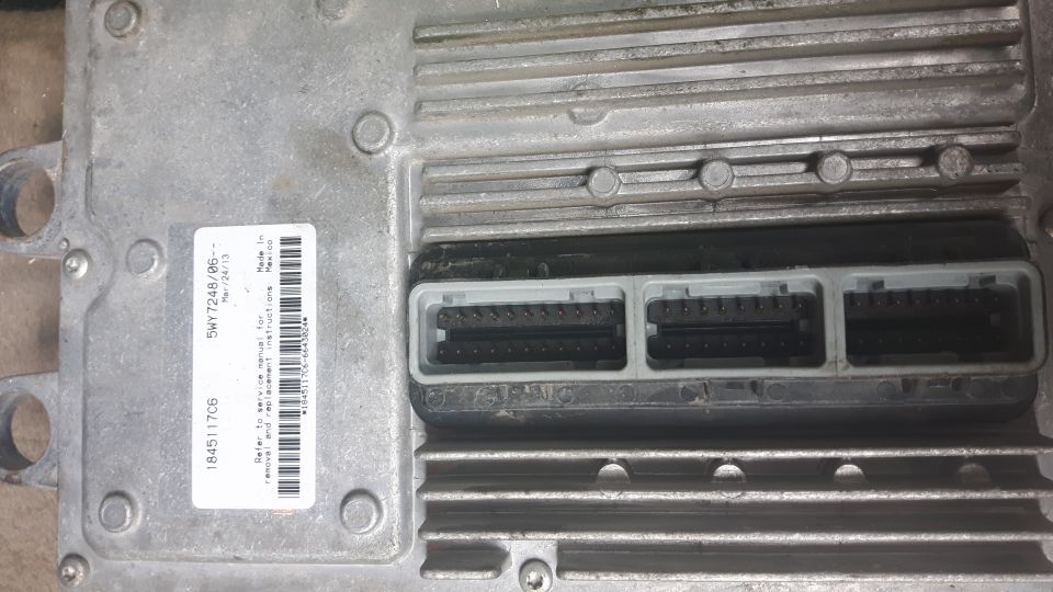 Engine control module with two grey electrical connectors and a label showing part number SW7248/06--