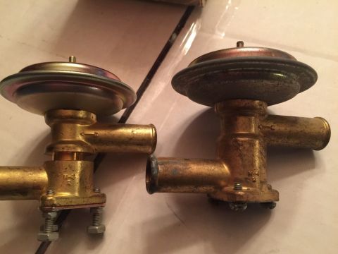 1967 Mercury Cougar - Two brass heater control valves are shown, one with visible stamping.