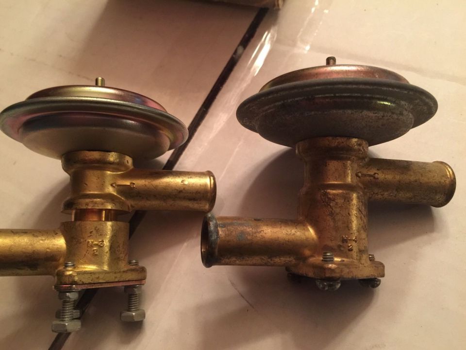 Two brass heater control valves with rubber diaphragms on top. One valve has 'H-3' stamped on it