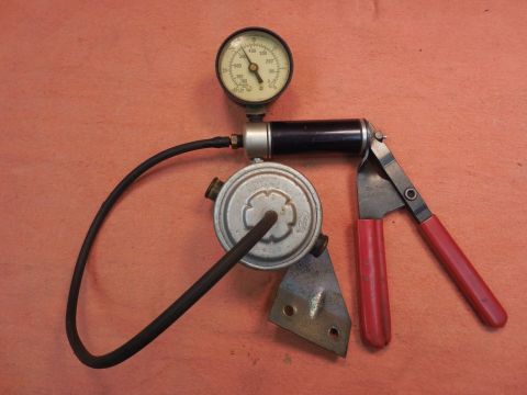 1967 Mercury Cougar - Fuel pressure regulator and gauge tool set, likely for automotive use.