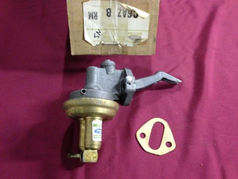 1967 Mercury Cougar - A Ford fuel pump and gasket are shown with a partial cardboard box and label.