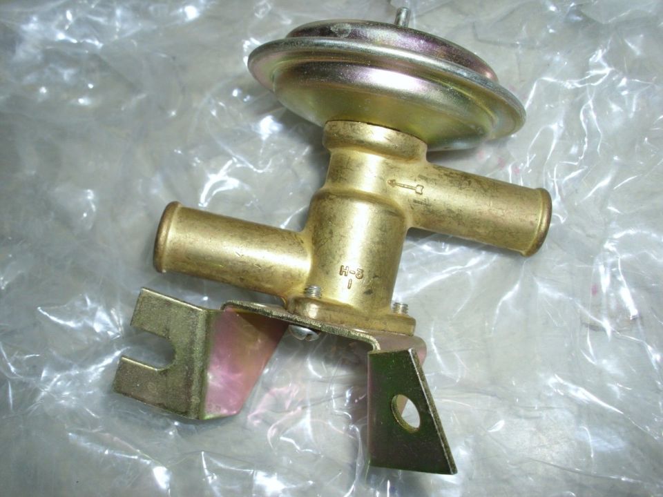 Brass heater control valve with metal mounting bracket, marked H-3